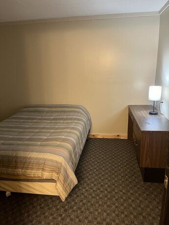 Imagen de la habitación del Hotel Brookside Motor inn. Foto 12