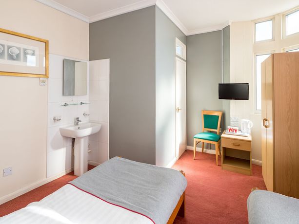Imagen de la habitación del Hotel Bros Inn Hotel. Foto 4
