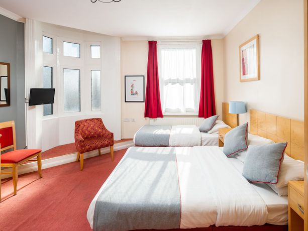 Imagen de la habitación del Hotel Bros Inn Hotel. Foto 6