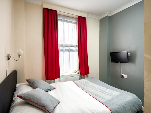 Imagen de la habitación del Hotel Bros Inn Hotel. Foto 11
