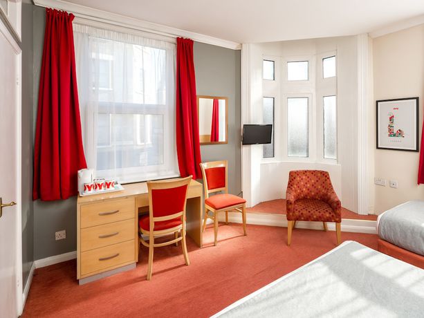 Imagen de la habitación del Hotel Bros Inn Hotel. Foto 12