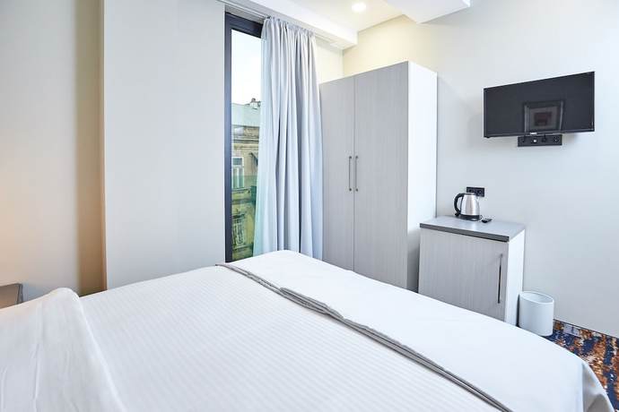 Imagen de la habitación del Hotel Brosse Garden. Foto 14