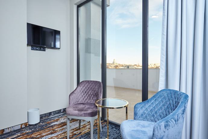 Imagen de la habitación del Hotel Brosse Garden. Foto 17