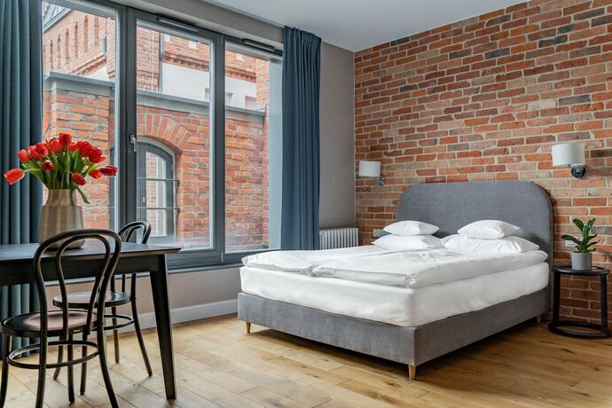 Imagen de la habitación del Hotel Browar Hevelius Apartments. Foto 13