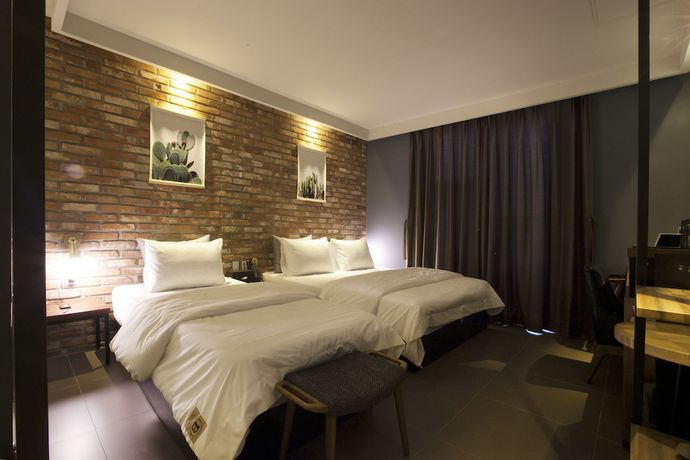 Imagen de la habitación del Hotel Brown Dot Hotel. Foto 7