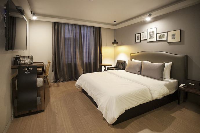 Imagen de la habitación del Hotel Brown Dot Hotel. Foto 8