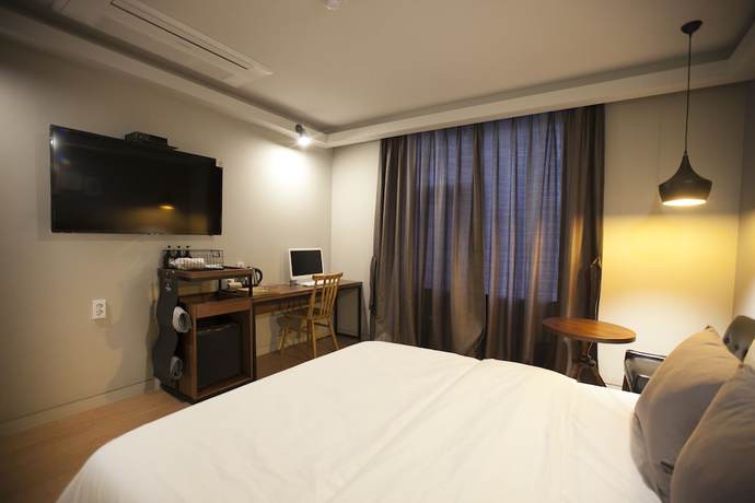 Imagen de la habitación del Hotel Brown Dot Hotel. Foto 9