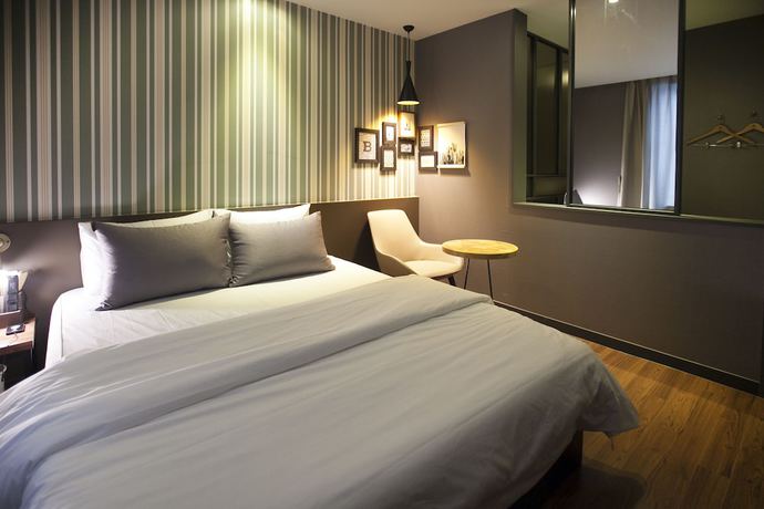 Imagen de la habitación del Hotel Brown Dot Hotel. Foto 10