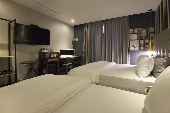 Imagen de la habitación del Hotel Brown Dot Hotel. Foto 11
