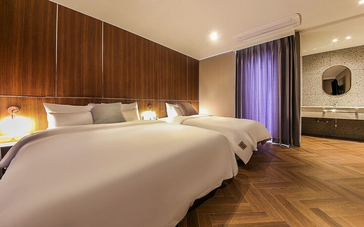 Imagen de la habitación del Hotel Brown Dot Nampo Chungmu. Foto 19