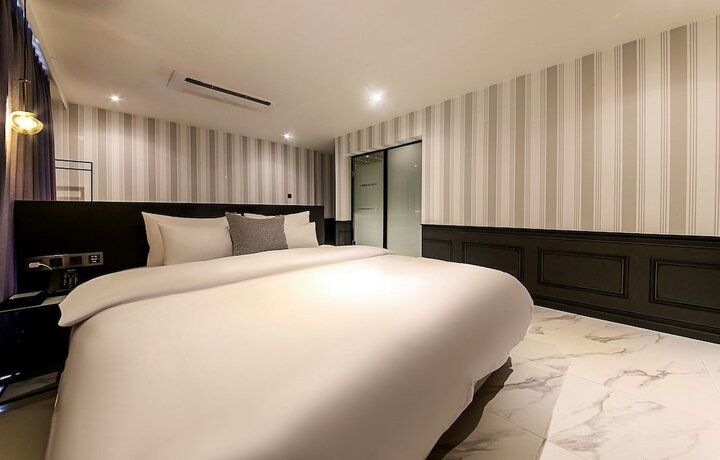 Imagen de la habitación del Hotel Brown Dot Nampo Chungmu. Foto 21
