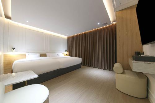 Imagen de la habitación del Hotel Brown Dot Pyeonghwa plaza. Foto 15