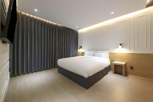Imagen de la habitación del Hotel Brown Dot Pyeonghwa plaza. Foto 16