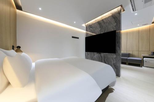 Imagen de la habitación del Hotel Brown Dot Pyeonghwa plaza. Foto 17