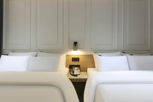 Imagen de la habitación del Hotel Brown Dot Pyeonghwa plaza. Foto 18