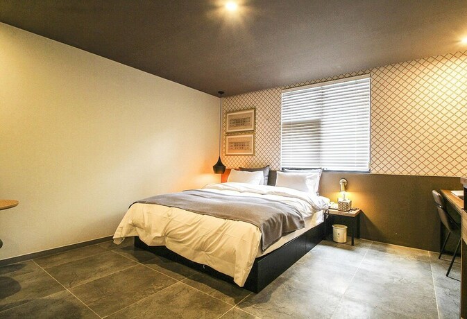 Imagen de la habitación del Hotel Brown Dot waterpark. Foto 32
