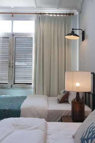 Imagen de la habitación del Hotel Brown Feather. Foto 21