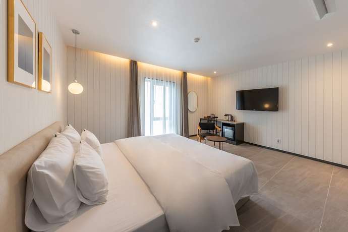 Imagen de la habitación del Hotel Browndot. Foto 16