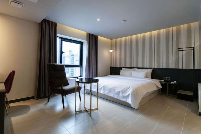 Imagen de la habitación del Hotel Browndot Hotel Hadan. Foto 11