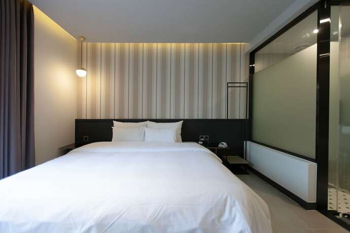 Imagen de la habitación del Hotel Browndot Hotel Hadan. Foto 12
