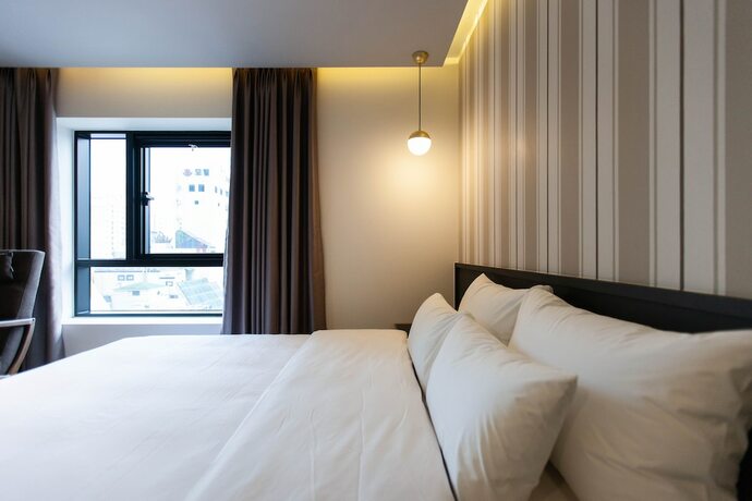 Imagen de la habitación del Hotel Browndot Hotel Hadan. Foto 16