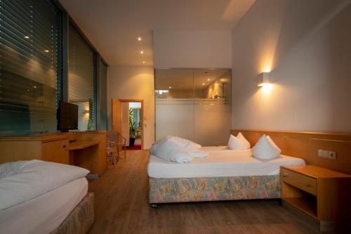 Imagen de la habitación del Hotel Bruggner Stub`n. Foto 18