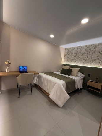 Imagen de la habitación del Hotel Bruma Verde Casa. Foto 3