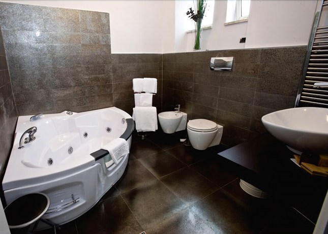 Imagen de la habitación del Hotel Bruman Caserta. Foto 11