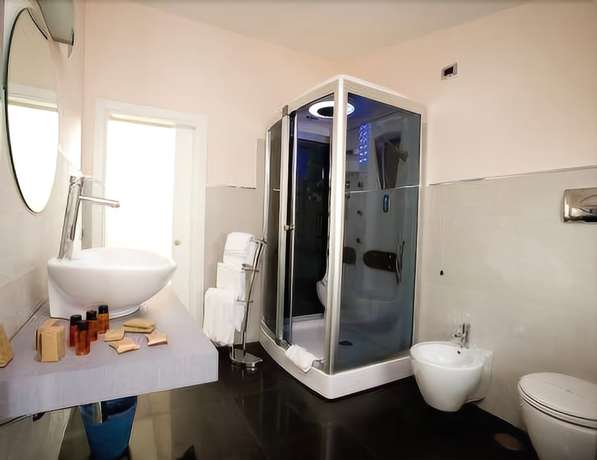 Imagen de la habitación del Hotel Bruman Caserta. Foto 19