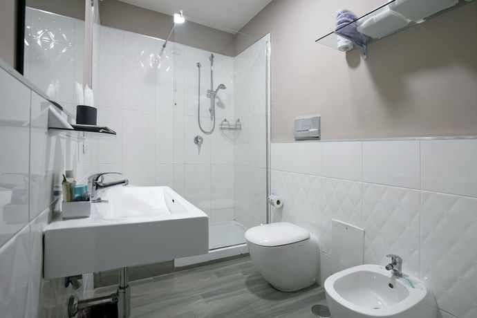 Imagen de la habitación del Hotel Bruman Salerno. Foto 11