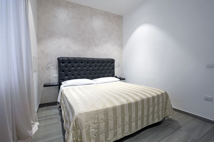 Imagen de la habitación del Hotel Bruman Salerno. Foto 13