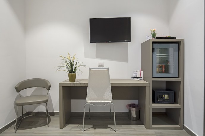 Imagen de la habitación del Hotel Bruman Salerno. Foto 15