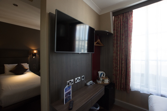 Imagen de la habitación del Hotel Brunel. Foto 9