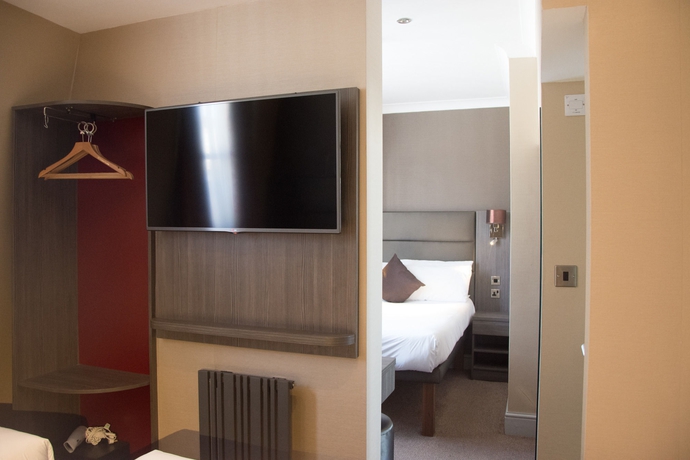 Imagen de la habitación del Hotel Brunel. Foto 10