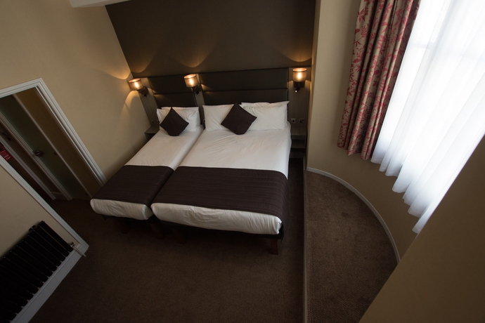 Imagen de la habitación del Hotel Brunel. Foto 12