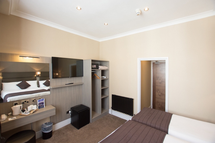 Imagen de la habitación del Hotel Brunel. Foto 13