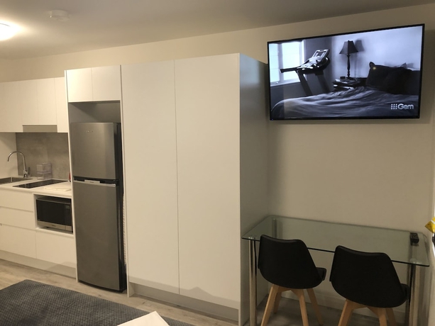 Imagen de la habitación del Hotel Brunker Suites. Foto 11