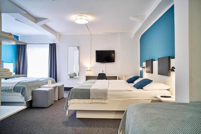 Imagen de la habitación del Hotel Brunnenhof City Center. Foto 9