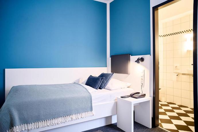 Imagen de la habitación del Hotel Brunnenhof City Center. Foto 10