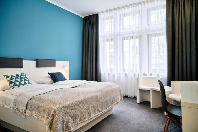 Imagen de la habitación del Hotel Brunnenhof City Center. Foto 11