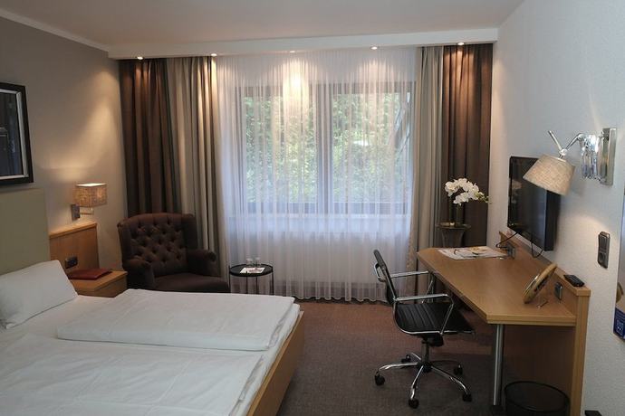 Imagen de la habitación del Hotel Brunnenhof International. Foto 7