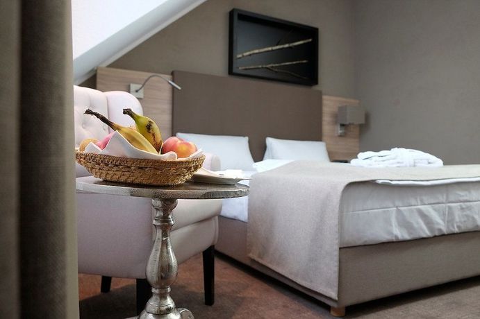 Imagen de la habitación del Hotel Brunnenhof International. Foto 11