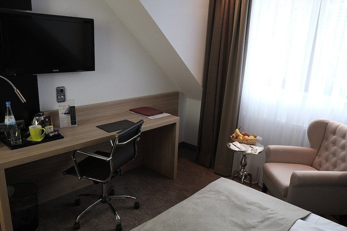 Imagen de la habitación del Hotel Brunnenhof International. Foto 13
