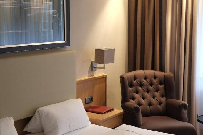 Imagen de la habitación del Hotel Brunnenhof International. Foto 14