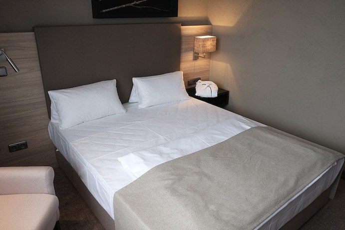 Imagen de la habitación del Hotel Brunnenhof International. Foto 15