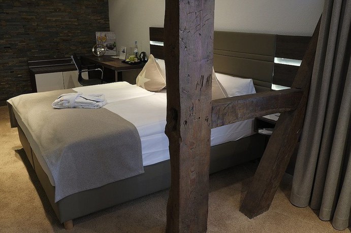 Imagen de la habitación del Hotel Brunnenhof International. Foto 16