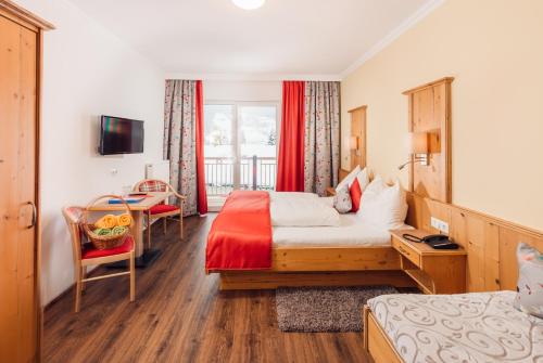 Imagen de la habitación del Hotel Br&uuml;ckenwirt, Sinnhub. Foto 7