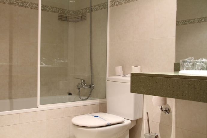 Imagen de la habitación del Hotel Bruxelles. Foto 16