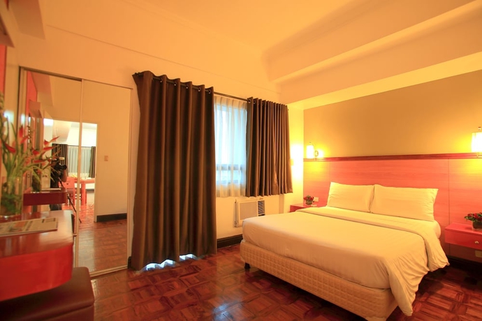 Imagen de la habitación del Hotel Bsa Suites Makati. Foto 2