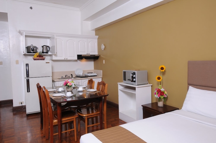 Imagen de la habitación del Hotel Bsa Suites Makati. Foto 4